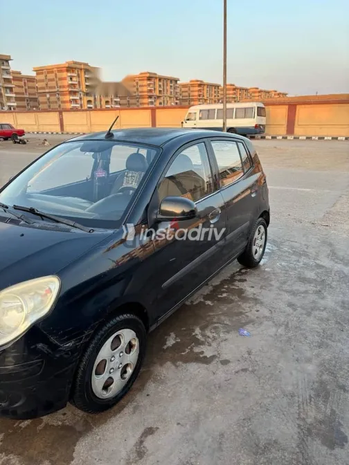 كيا بيكانتو 2011 أسود مستعملة للبيع - 4