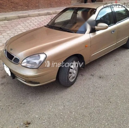 دايو نوبيرا 2005 ذهبي مستعملة للبيع - 4