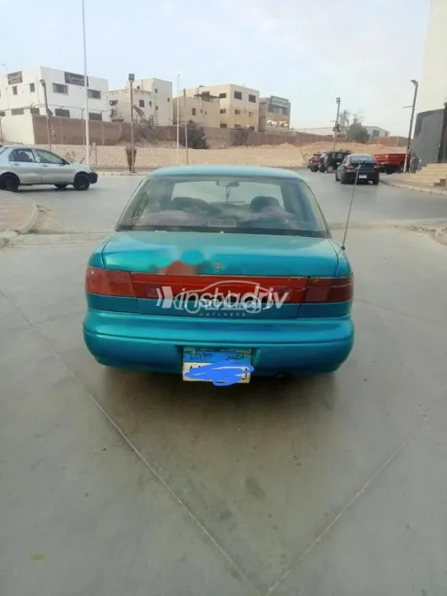 كيا سيفيا 1995 أبيض مستعملة للبيع - 4