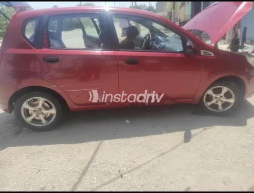 شيفروليه افيو 2009 أحمر مستعملة للبيع - 2