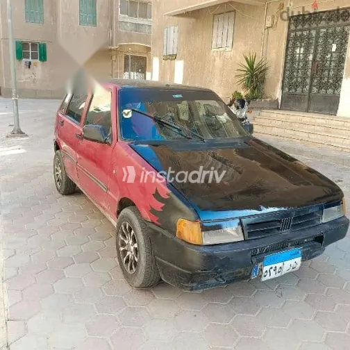 فيات اونو 1993 أحمر مستعملة للبيع - 3