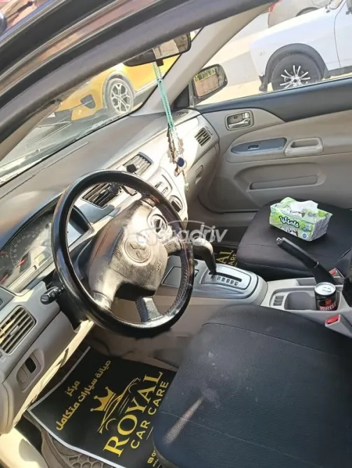 ميتسوبيشي لانسر بومة 2006 أسود مستعملة للبيع - 4