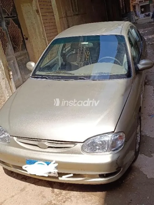 كيا سيفيا 1999 ذهبي مستعملة للبيع - 1