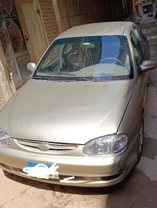 كيا سيفيا 1999 ذهبي مستعملة للبيع