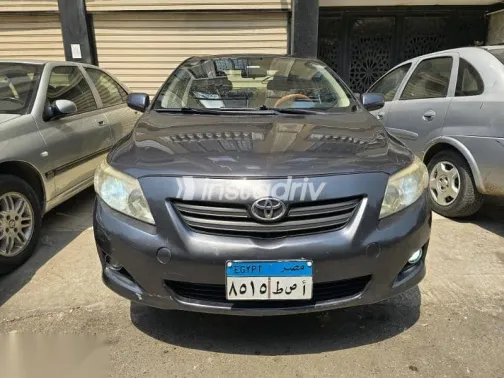 تويوتا كورولا 2009 رمادي مستعملة للبيع - 1