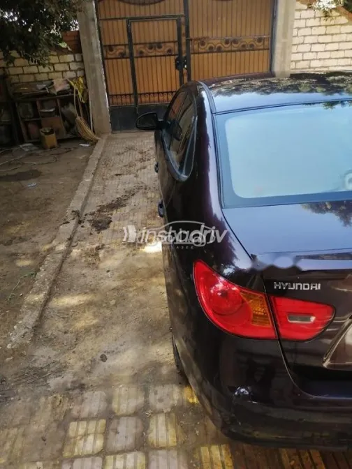 هيونداي إلنترا اتش دى 2009 برونزي مستعملة للبيع - 5