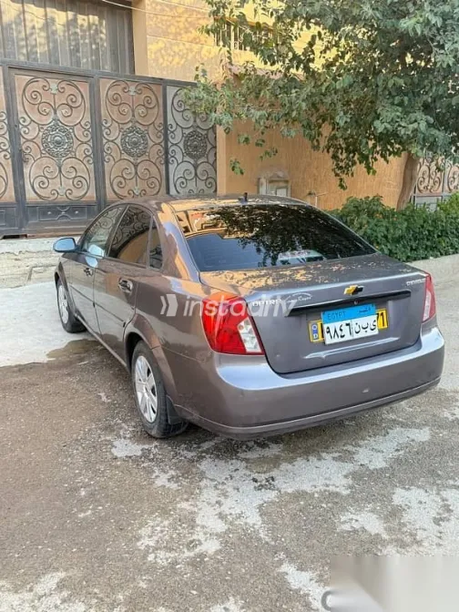 شيفروليه أوبترا 2013 رمادي مستعملة للبيع - 3