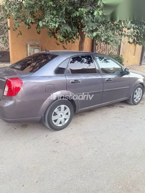 شيفروليه أوبترا 2013 رمادي مستعملة للبيع - 4
