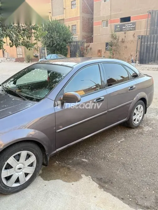 شيفروليه أوبترا 2013 رمادي مستعملة للبيع - 5