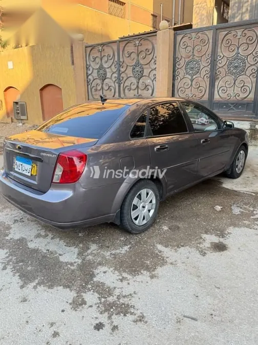شيفروليه أوبترا 2013 رمادي مستعملة للبيع - 6