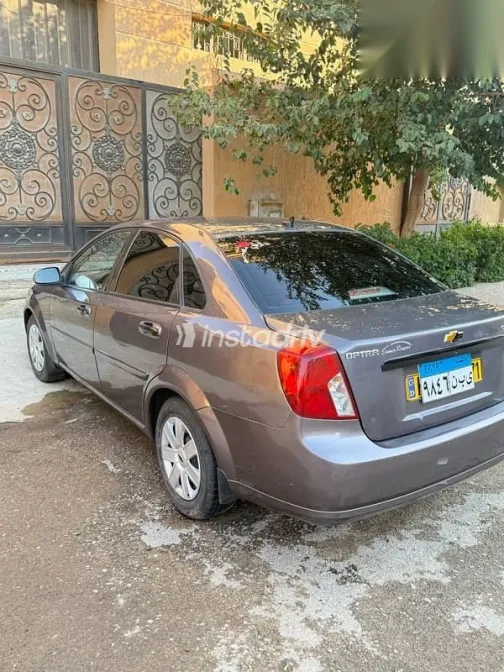 شيفروليه أوبترا 2013 رمادي مستعملة للبيع - 7