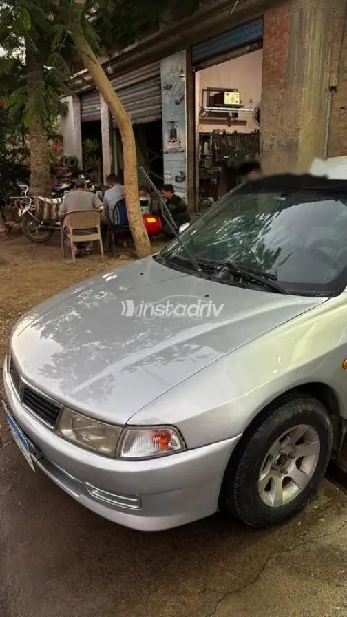 ميتسوبيشي لانسر كرستالة 1999 فضي مستعملة للبيع - 1