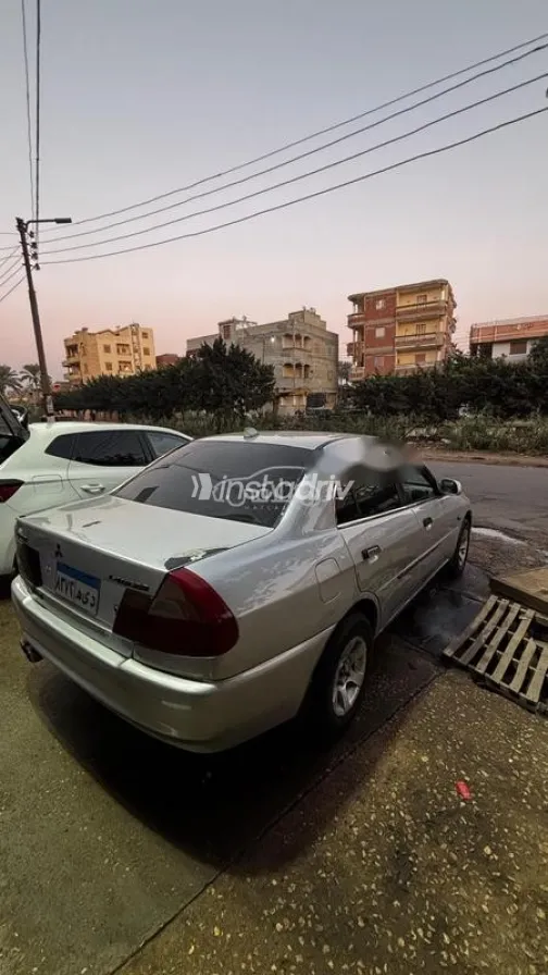 ميتسوبيشي لانسر كرستالة 1999 فضي مستعملة للبيع - 2