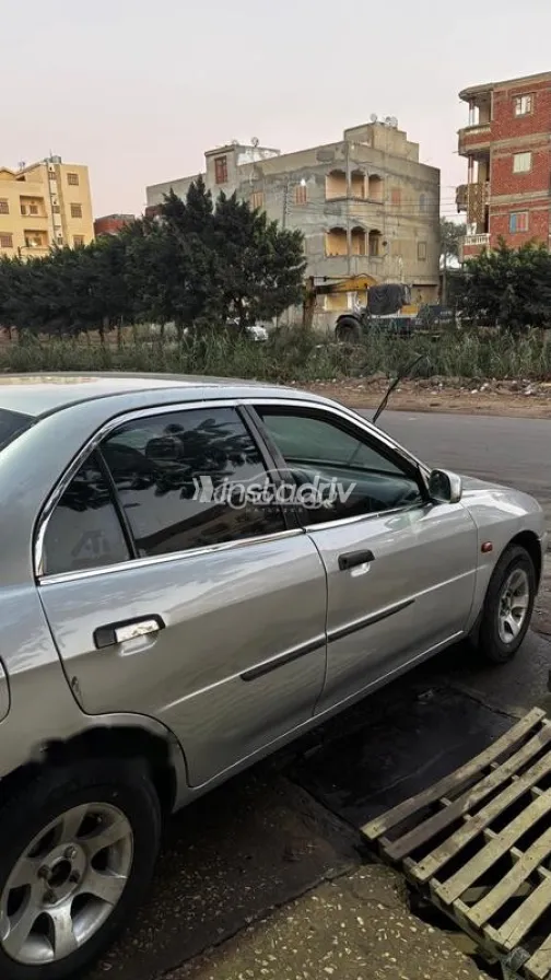 ميتسوبيشي لانسر كرستالة 1999 فضي مستعملة للبيع - 4