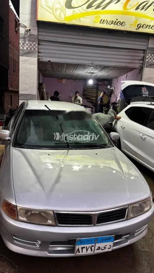 ميتسوبيشي لانسر كرستالة 1999 فضي مستعملة للبيع - 5