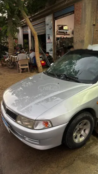 ميتسوبيشي لانسر كرستالة 1999 فضي مستعملة للبيع