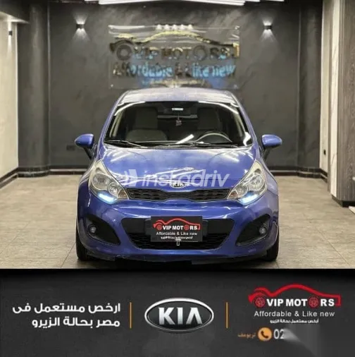 كيا ريو 2012 أزرق غامق مستعملة للبيع - 1