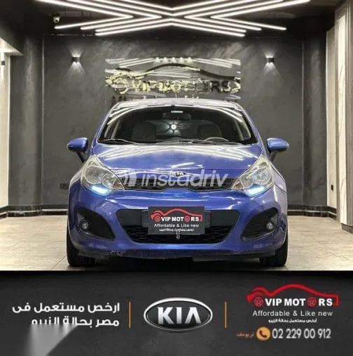 كيا ريو 2012 أزرق غامق مستعملة للبيع - 2