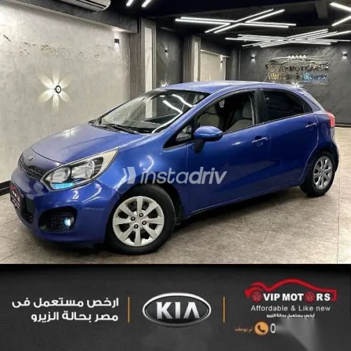 كيا ريو 2012 أزرق غامق مستعملة للبيع - 4