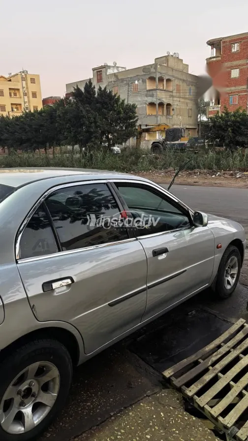 ميتسوبيشي لانسر 1999 فضي مستعملة للبيع - 4