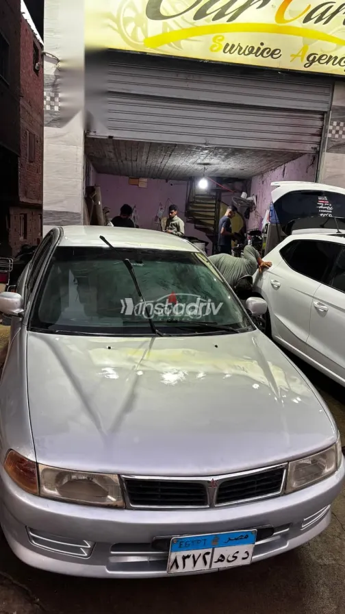 ميتسوبيشي لانسر 1999 فضي مستعملة للبيع - 5