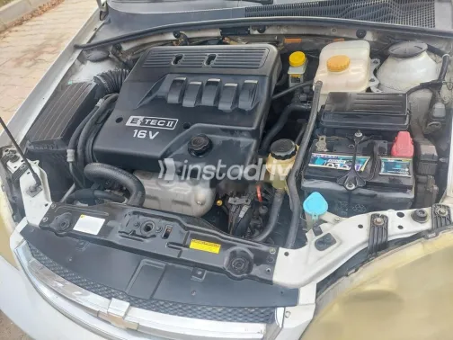 شيفروليه أوبترا 2014 أبيض مستعملة للبيع - 1