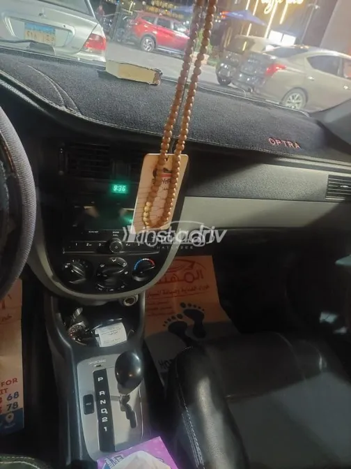 شيفروليه أوبترا 2014 أبيض مستعملة للبيع - 2