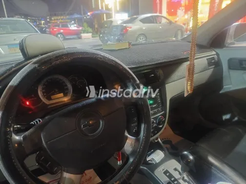 شيفروليه أوبترا 2014 أبيض مستعملة للبيع - 3