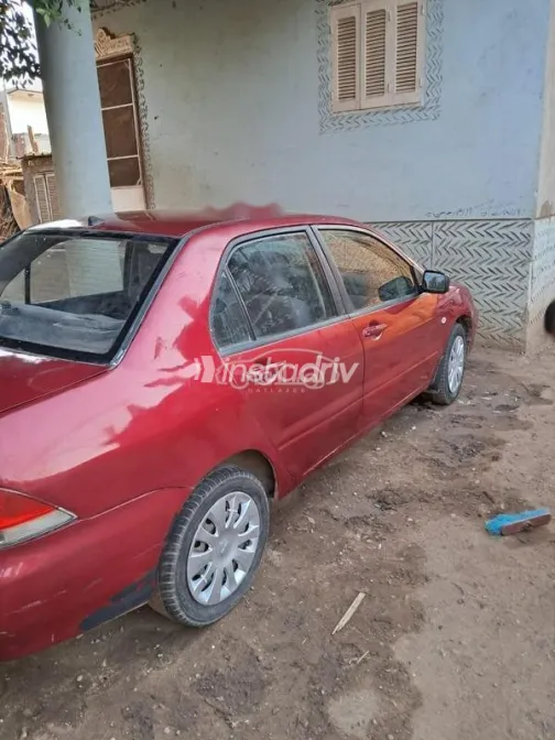 ميتسوبيشي لانسر بومة 2007 أحمر غامق مستعملة للبيع - 2