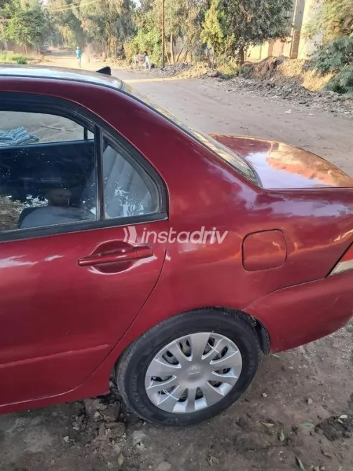 ميتسوبيشي لانسر بومة 2007 أحمر غامق مستعملة للبيع - 3