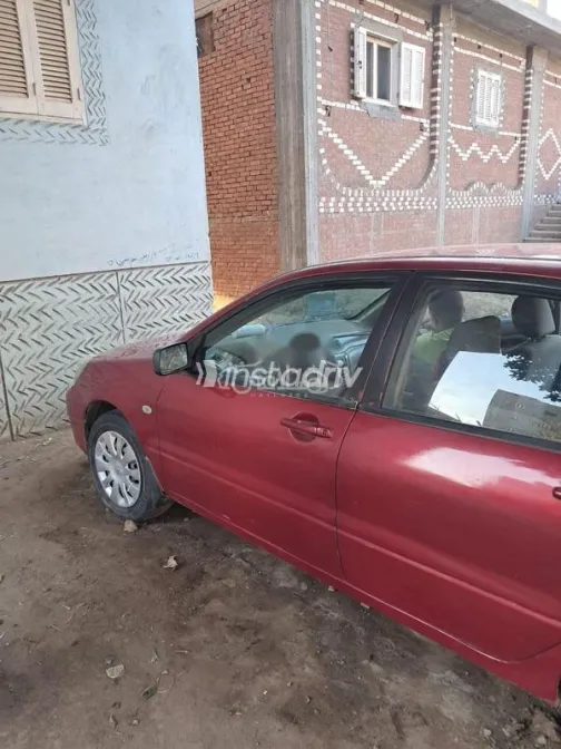 ميتسوبيشي لانسر بومة 2007 أحمر غامق مستعملة للبيع - 4