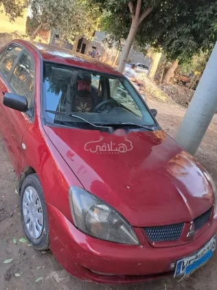 ميتسوبيشي لانسر بومة 2007 أحمر غامق مستعملة للبيع