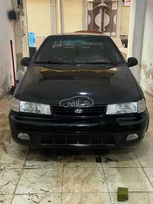 هيونداي اكسيل 1995 أسود مستعملة للبيع