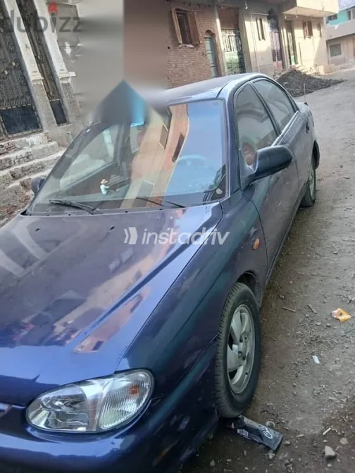 كيا سيفيا 1999 أزرق غامق مستعملة للبيع - 4