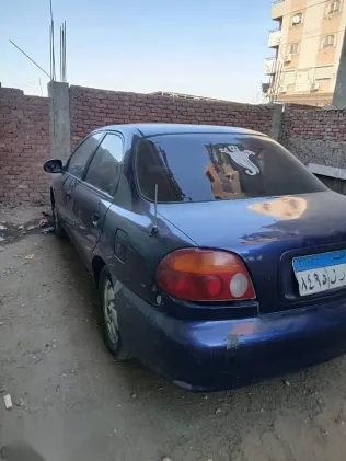 كيا سيفيا 1999 أزرق غامق مستعملة للبيع