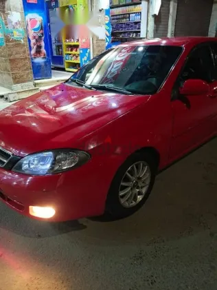 اوبل أسترا 2006 أحمر مستعملة للبيع