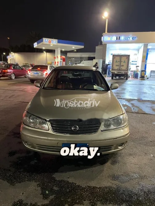 نيسان صنى 2005 ذهبي مستعملة للبيع - 1