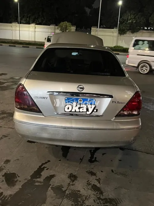 نيسان صنى 2005 ذهبي مستعملة للبيع - 2