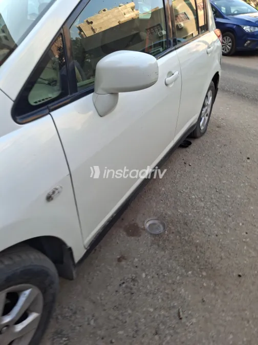 نيسان تيدا 2006 أبيض مستعملة للبيع - 2