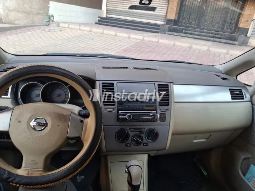 نيسان تيدا 2006 أبيض مستعملة للبيع - 9