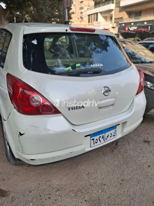 نيسان تيدا 2006 أبيض مستعملة للبيع - 10