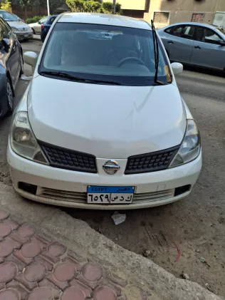 نيسان تيدا 2006 أبيض مستعملة للبيع