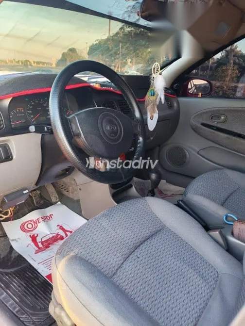 كيا ريو 2001 أحمر مستعملة للبيع - 6