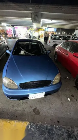 دايو لانوس 2004 أزرق غامق مستعملة للبيع