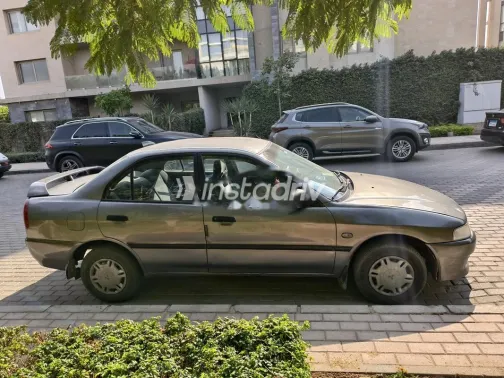 ميتسوبيشي لانسر كرستالة 1997 فضي مستعملة للبيع - 3