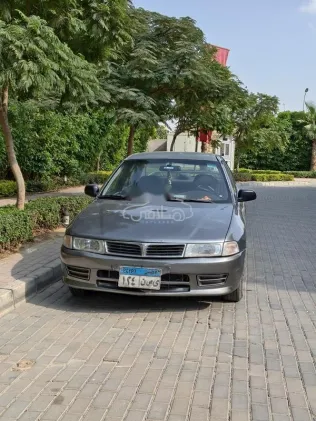 ميتسوبيشي لانسر كرستالة 1997 فضي مستعملة للبيع
