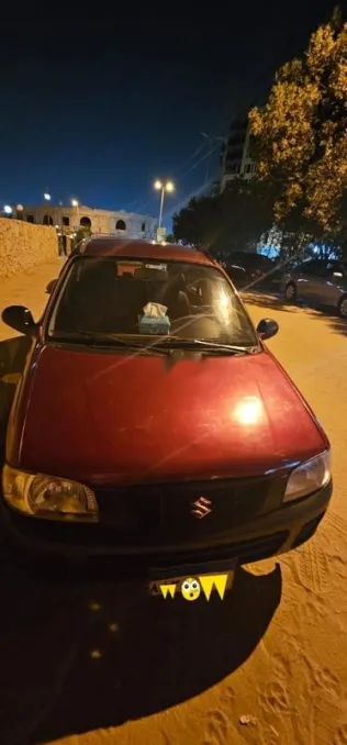 سوزوكى التو 2013 أحمر غامق مستعملة للبيع