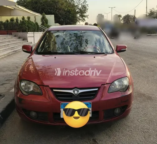 بروتون بيرسونا 2015 أحمر غامق مستعملة للبيع - 1