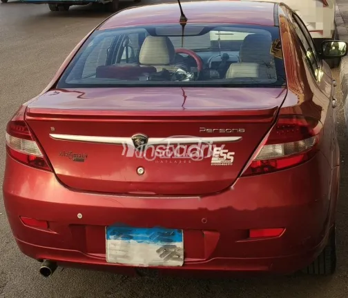 بروتون بيرسونا 2015 أحمر غامق مستعملة للبيع - 2