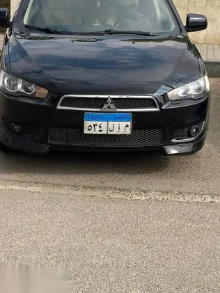 ميتسوبيشي لانسر 2008 أسود مستعملة للبيع